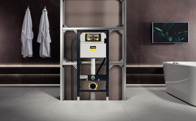 Kuvassa Viega Prevista Dry -kiskoelementeillä rakennettu väliseinä. Kiskojärjestelmässä kiinni seinä-WC-elementti.